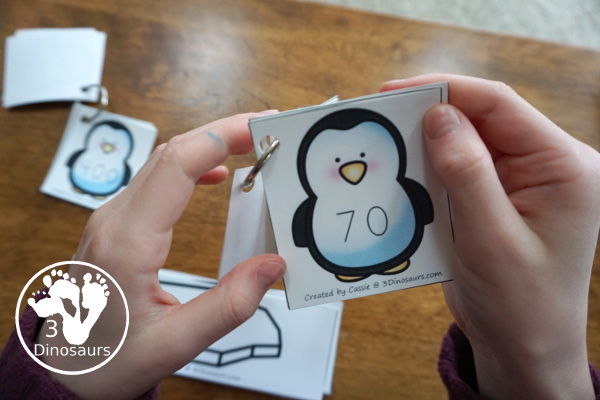 Free Penguin Place Value Matching - 2 levels of learning with place value up to hundreds for first grade and second grade learning with matching cards and recording sheets  - 3Dinosaurs.com