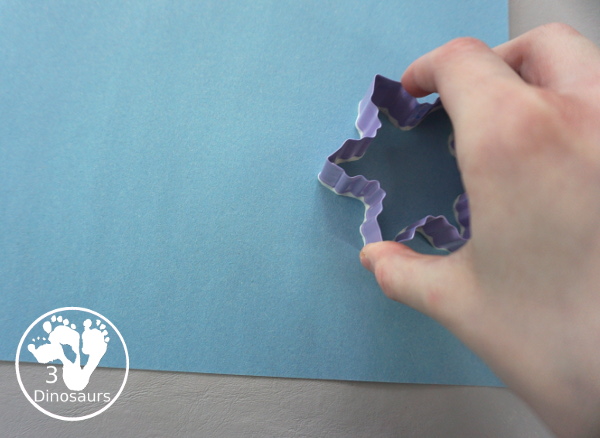 Making Snowflakes - Snowflake Cookie Cutter Painting - a simple painting craft that different ages of kids can do - 3Dinosaurs.com