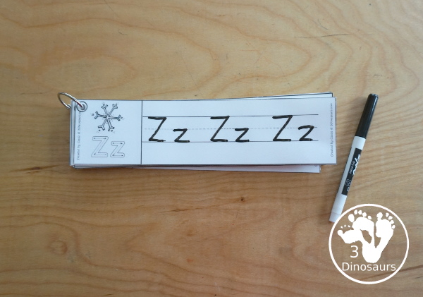 Free Snowflake Theme ABC Tracing Strips - with uppercase and lowercase together. You have fun kids with a snowflake plus you can see an example of how to trace the letters - 3Dinosaurs.com