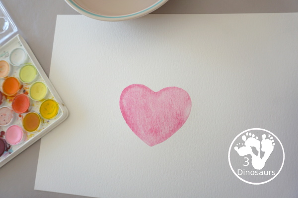 Watercolor Hearts Painting For Kids - a fun painting activity using watercolor and cookie cutters to make a really fun painting for Valentines - 3Dinosaurs.com