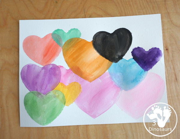Watercolor Hearts Painting For Kids - a fun painting activity using watercolor and cookie cutters to make a really fun painting for Valentines - 3Dinosaurs.com