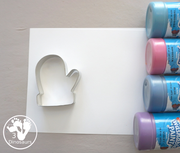 Mitten Cookie Cutter Stamp Painting - a simple winter painting that kids can do with a mitten cookie cutter. - 3Dinosaurs.com
