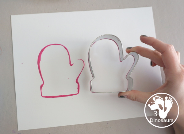 Mitten Cookie Cutter Stamp Painting - a simple winter painting that kids can do with a mitten cookie cutter. - 3Dinosaurs.com