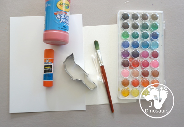 Winter Cardinal Painting for Kids is a great winter painting with watercolors, and cardinal cookie cutter to make a great winter painting. - 3Dinosaurs.com