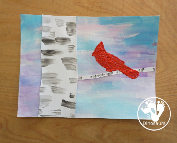 Winter Cardinal Painting for Kids is a great winter painting with watercolors, and cardinal cookie cutter to make a great winter painting. - 3Dinosaurs.com