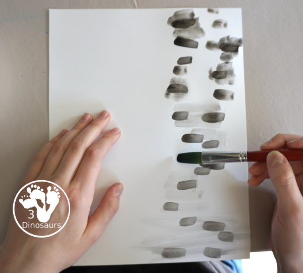 Winter Cardinal Painting for Kids is a great winter painting with watercolors, and cardinal cookie cutter to make a great winter painting. - 3Dinosaurs.com