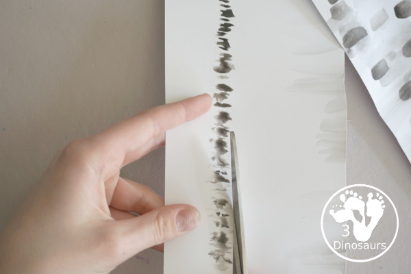 Winter Cardinal Painting for Kids is a great winter painting with watercolors, and cardinal cookie cutter to make a great winter painting. - 3Dinosaurs.com