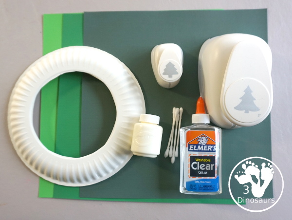 Winter Evergreen Tree Wreath Craft - a fun winter theme wreath with evergreen trees with white q-tip painting a fun craft for prek and kindergarten - 3Dinosaurs.com