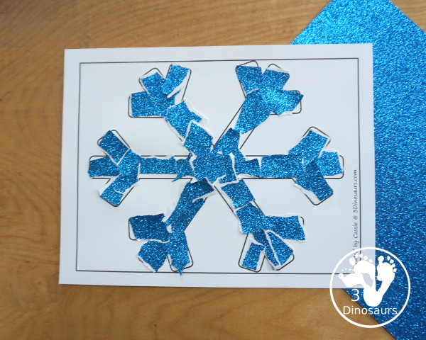 Torn Paper Glitter Snowflake Craft - a fun torn paper craft to make snowflakes out of glitter paper a fun winter craft for kids. - 3Dinosaurs.com
