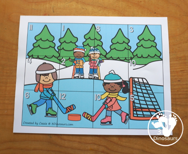 Free Hockey Addition Puzzle Printable - a fun 12 piece puzzle with addition from 1 to 12 on the puzzle mat with matching puzzle pieces. A fun winter sports theme for an addition center. - 3Dinosaurs.com