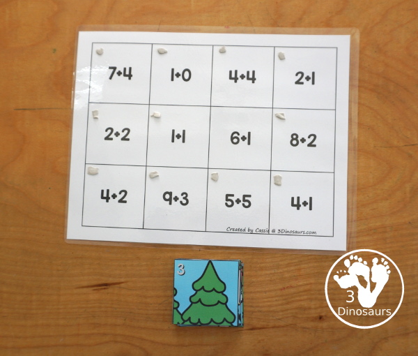 Free Hockey Addition Puzzle Printable - a fun 12 piece puzzle with addition from 1 to 12 on the puzzle mat with matching puzzle pieces. A fun winter sports theme for an addition center. - 3Dinosaurs.com