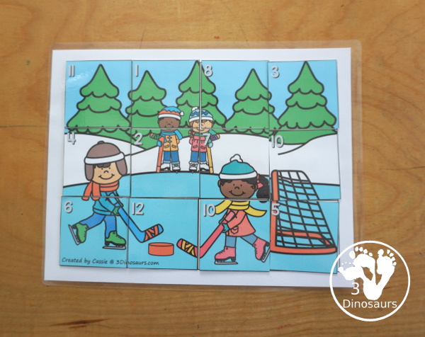 Free Hockey Addition Puzzle Printable - a fun 12 piece puzzle with addition from 1 to 12 on the puzzle mat with matching puzzle pieces. A fun winter sports theme for an addition center. - 3Dinosaurs.com