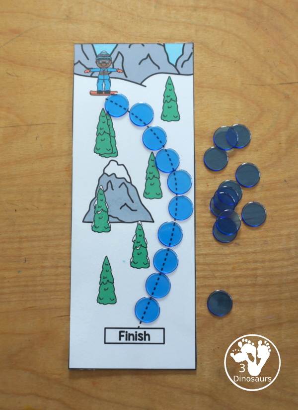 Free Skiing Prewriting Strip Printables - has 10 different prewriting strip that are a vertical with tracing from top to bottom. An easy way to work change up prewriting for the winter.- 3Dinosaurs.com