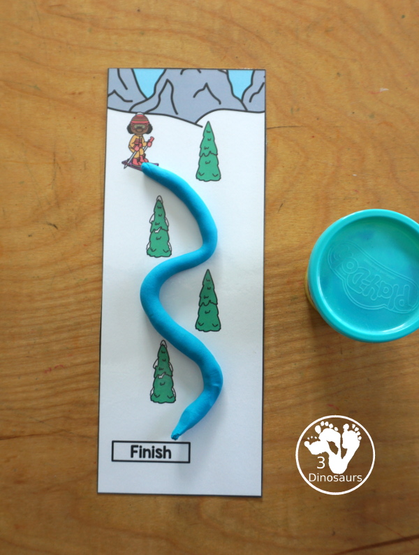 Free Skiing Prewriting Strip Printables - has 10 different prewriting strip that are a vertical with tracing from top to bottom. An easy way to work change up prewriting for the winter.- 3Dinosaurs.com