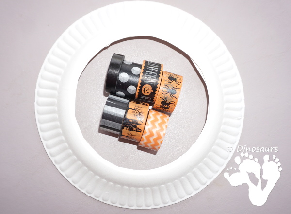 Fun Fine Motor Craft: Washi Tape Halloween Wreath - kids will get will work on fine motor skills while making a fun wreath for Halloween. - 3Dinosaurs.com