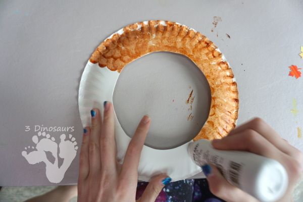 Fall Leaf Themed Wreath - fun wreath that kids can make with oil pastels and leaf punches - 3Dinosaurs.com