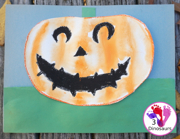 Watercolor Process Art Jack-O-Lantern - a fun Halloween painting activity to do with kids. It is great for kids that love to be creative and do things their own way - 3Dinosaurs.com