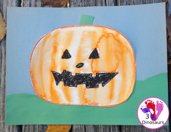 Watercolor Process Art Jack-O-Lantern - a fun Halloween painting activity to do with kids. It is great for kids that love to be creative and do things their own way - 3Dinosaurs.com