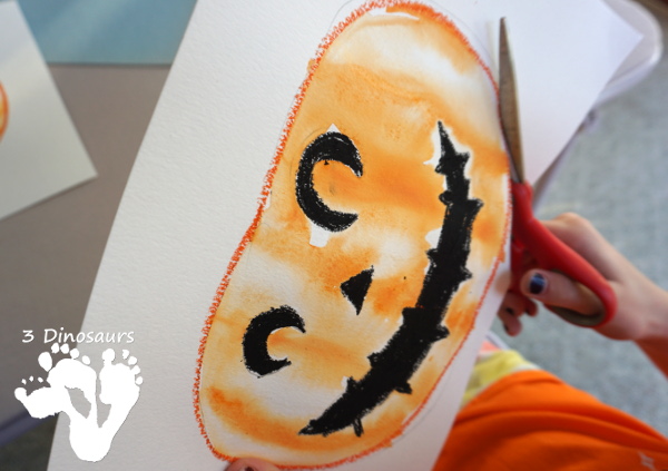 Watercolor Process Art Jack-O-Lantern - a fun Halloween painting activity to do with kids. It is great for kids that love to be creative and do things their own way - 3Dinosaurs.com