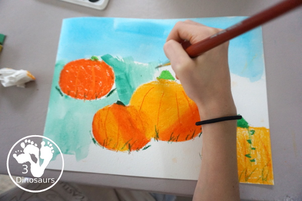 Jack-O-Lantern Patch Oil Pastel and Watercolor - a fun mixed art project for kids to do for Halloween! - 3Dinosaurs.com