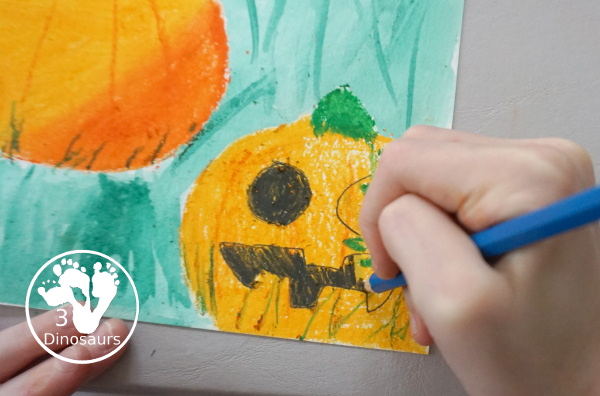 Jack-O-Lantern Patch Oil Pastel and Watercolor - a fun mixed art project for kids to do for Halloween! - 3Dinosaurs.com