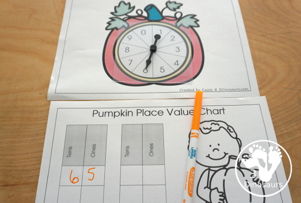 Free Pumpkin Spin & Write Place Value - You have 5 different spinners and 4 recording mats in color and black and white with place value from ones to Ones, Tens, Hundreds, Thousands, Ten Thousand, Hundred Thousands, Million, & Ten Million  - 3Dinosaurs.com