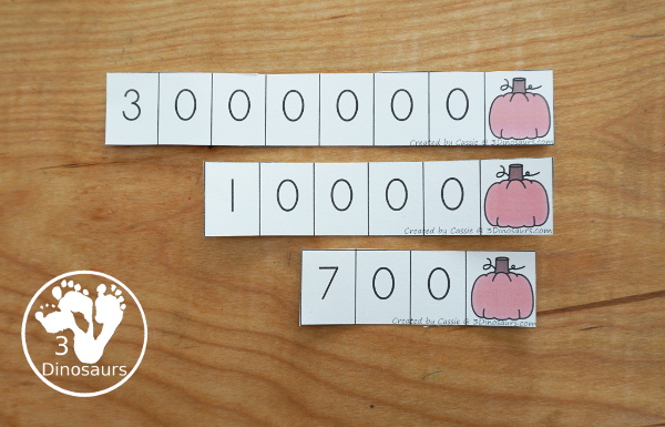 Free Pumpkin Spin & Write Place Value - You have 5 different spinners and 4 recording mats in color and black and white with place value from ones to Ones, Tens, Hundreds, Thousands, Ten Thousand, Hundred Thousands, Million, & Ten Million  - 3Dinosaurs.com