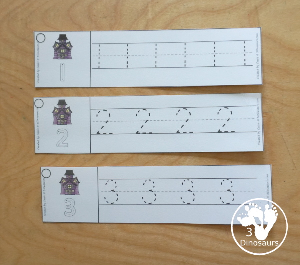 Free Halloween Number Tracing Strips - with numbers 0 to 20. A fun haunted house themed with a barn on each printable number tracing strip - 3Dinosaurs.com