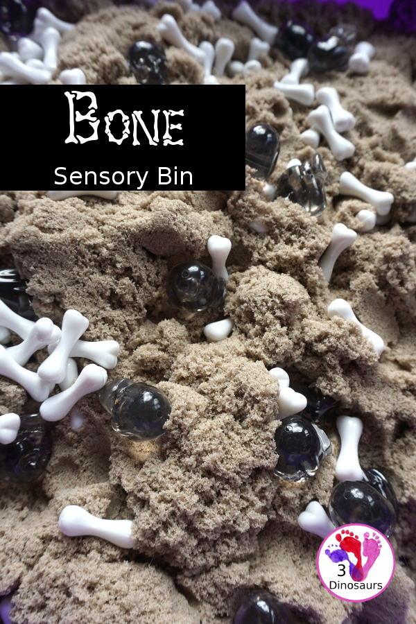 Bone Sensory Bin for Halloween - a fun kinetic sand sensory bin with a bone theme for Halloween - 3Dinosaurs.com