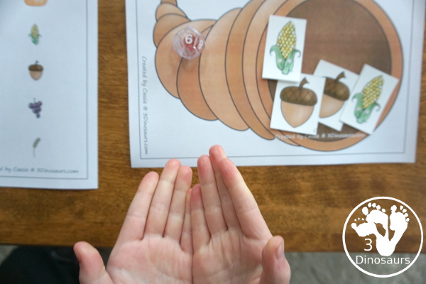 Free Roll A Cornucopia Printable - an easy way to work on counting 1 to 6, addition up to 12, or multiplication 1 to 6 or 1 to 12 with a hands-on math and recording sheet for addition and multiplication - 3Dinosaurs.com