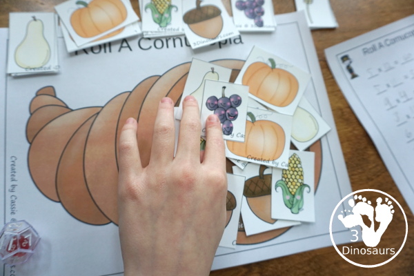 Free Roll A Cornucopia Printable - an easy way to work on counting 1 to 6, addition up to 12, or multiplication 1 to 6 or 1 to 12 with a hands-on math and recording sheet for addition and multiplication - 3Dinosaurs.com