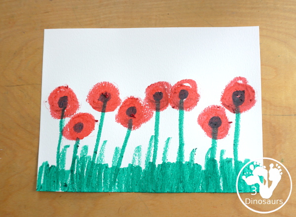 Paint Stick Poppy Painting For Veteran's Day - a simple painting using only paint sticks to make a field of poppies. A simple painting activity that kids will have loads of fun making for Veteran's Day or Memorial Day. - 3Dinosaurs.com