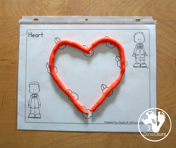 Free Poppy Shape Tracing Printable - has 12 shapes for kids to trace and color the poppies on the shapes. A great Veteran's Day shape printable for kids working on fine motor skills and shapes. - 3Dinosaurs.com