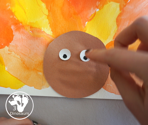 Turkey Feather Watercolor Painting for Kids - a fun turkey craft made with a cookie cutter feather and construction paper. A fun watercolor painting idea with feathers for a Thanksgiving craft for kids in preschool, prek, and kindergarten. 3Dinosaurs.co