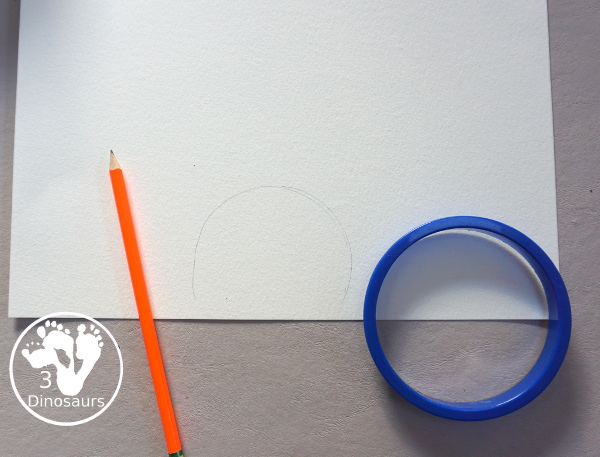 Turkey Feather Watercolor Painting for Kids - a fun turkey craft made with a cookie cutter feather and construction paper. A fun watercolor painting idea with feathers for a Thanksgiving craft for kids in preschool, prek, and kindergarten. 3Dinosaurs.co