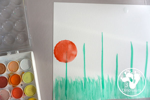 Watercolor Poppy Painting For Veteran's Day - a fun  watercolor painting using cookie cutters for the circle flowers and q-tip painting for the center. Simple and easy to do with kids. - 3Dinosaurs.com