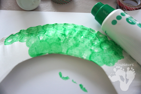 Fun To Make Christmas Washi Tape Ornament Wreath - fun fine motor craft to make for Christmas - 3Dinosaurs.com #finemotor #christmas #craftsforkids