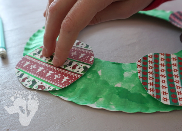 Fun To Make Christmas Washi Tape Ornament Wreath - fun fine motor craft to make for Christmas - 3Dinosaurs.com #finemotor #christmas #craftsforkids