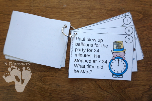 Free New Years Clock Task Cards -  2 levels of cards with matching worksheets. - 3Dinosaurs.com #printablesforkids #tellingtime #newyearsprintables #freeprintables