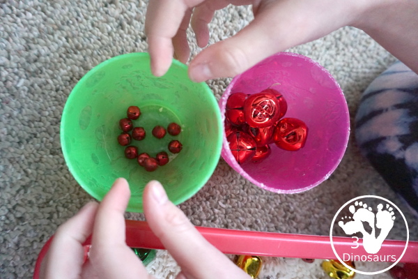 Jingle Bell Sensory Bin - a fun way to do activities with bells and sensory play at the same time. Easy to set up and use for Christmas time. - 3Dinosaurs.com