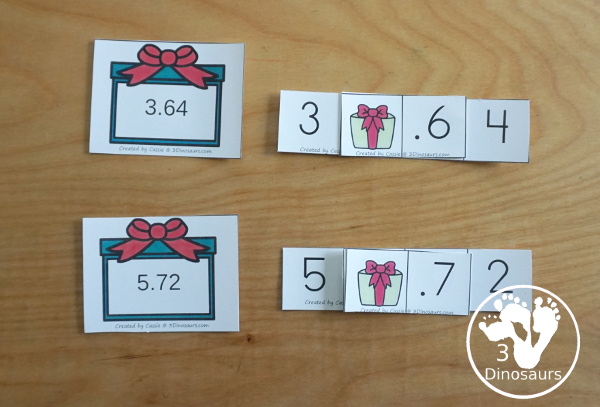 Free Christmas Themed Place Value Arrow Cards - work on building numbers from 0 to 9999 or 9999.99 to 0.99 with these Christmas Themed arrow cards. Plus use task cards to build the numbers. - 3Dinosaurs.com