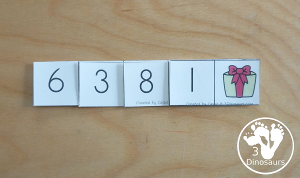 Free Christmas Themed Place Value Arrow Cards - work on building numbers from 0 to 9999 or 9999.99 to 0.99 with these Christmas Themed arrow cards. Plus use task cards to build the numbers. - 3Dinosaurs.com