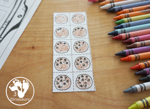 Free Cookie Subtraction Cut & Paste Worksheet - two fun worksheets that work on subtraction and matching cookies with chocolate chips for the answers. It is a fun change to subtraction worksheets for kids. - 3Dinosaurs.com