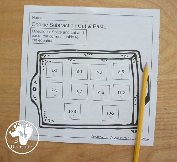 Free Cookie Subtraction Cut & Paste Worksheet - two fun worksheets that work on subtraction and matching cookies with chocolate chips for the answers. It is a fun change to subtraction worksheets for kids. - 3Dinosaurs.com