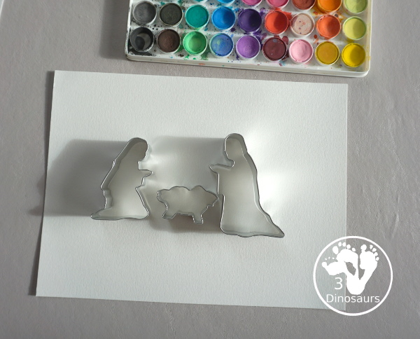 Nativity Painting with Cookie Cutters is a great nativity activity that you can do with kids. A great nativity scene that kids can make with watercolors and paint and cookie cutters. - 3Dinosaurs.com