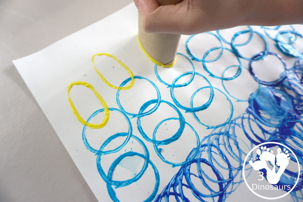 Paper Roll Painted Menorah - a fun painting activity using paper rolls to make a menorah for kids - 3Dinosaurs.com