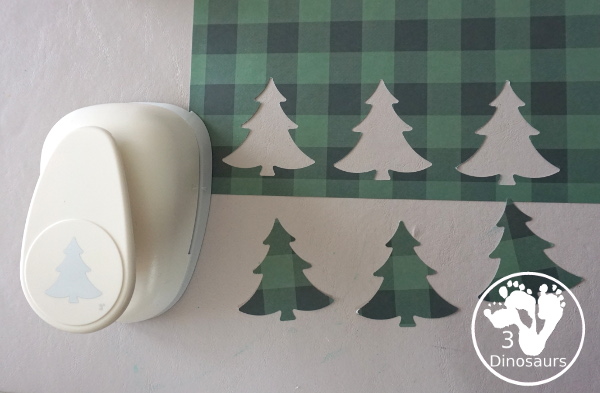 Reindeer Christmas Wreath Craft - a super easy wreath made with reindeer punches and tree punches that kids can make - 3Dinosaurs.com