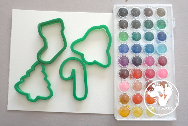 Christmas Watercolor Cookie Cutter Painting - easy Christmas watercolor painting with candy canes, bells, stockings and trees - 3Dinosaurs.com