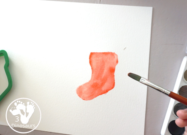 Christmas Watercolor Cookie Cutter Painting - easy Christmas watercolor painting with candy canes, bells, stockings and trees - 3Dinosaurs.com