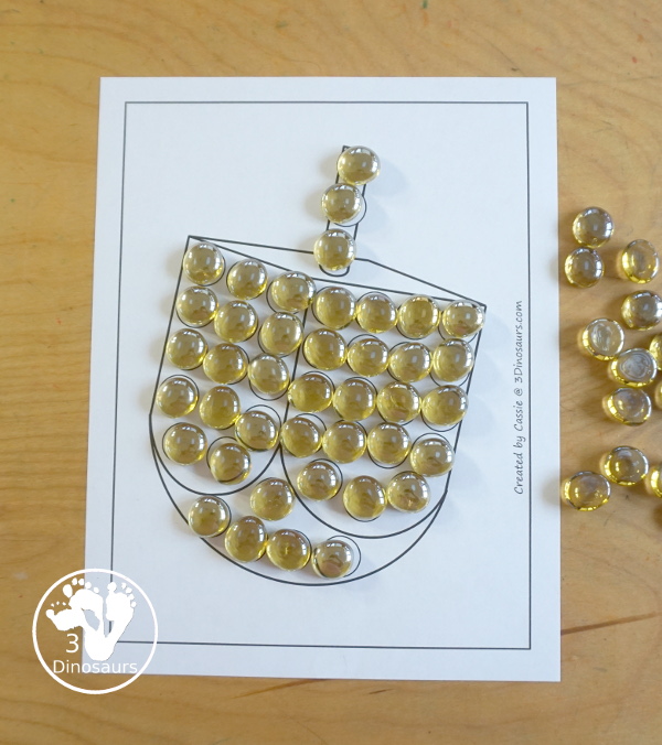 Free Dreidel Fine Motor Mat Printables with dreidel template, dreidel tracing worksheet, and dreidel dot marker printable for working on Fine motor skills for Hanukkah - 3Dinosaurs.com